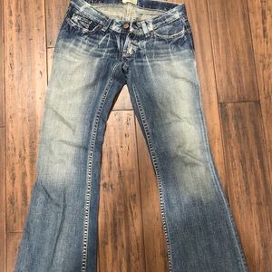 Light washed denim women’s boot cut jeans